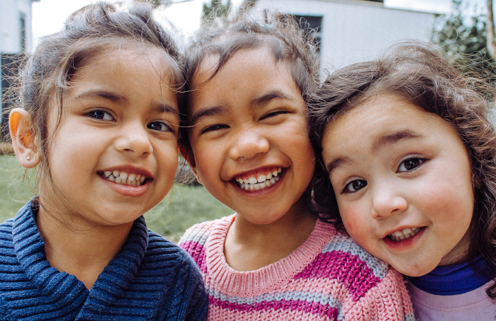 Girls Smiling and Playing Team Games