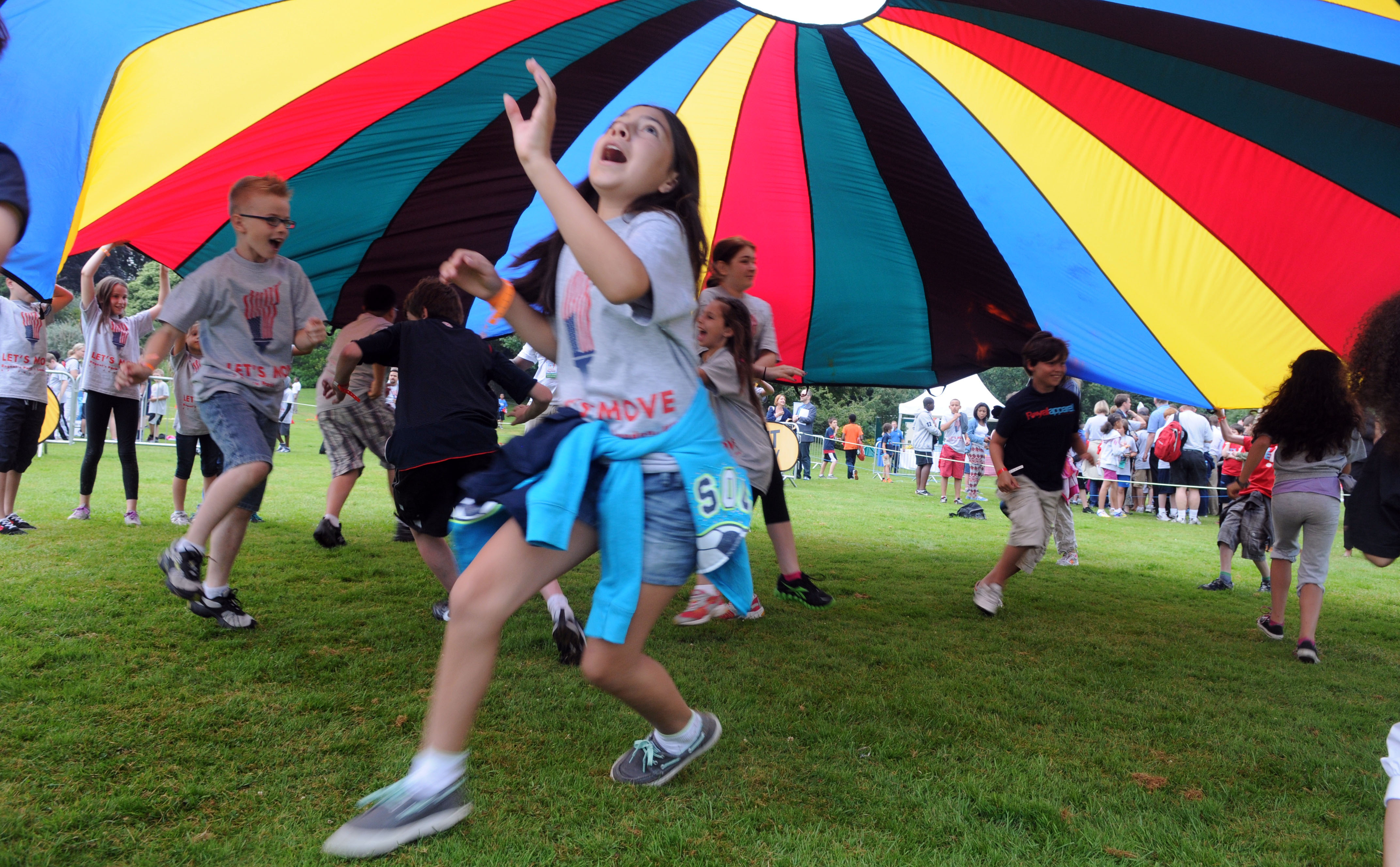 Children playing parachute game