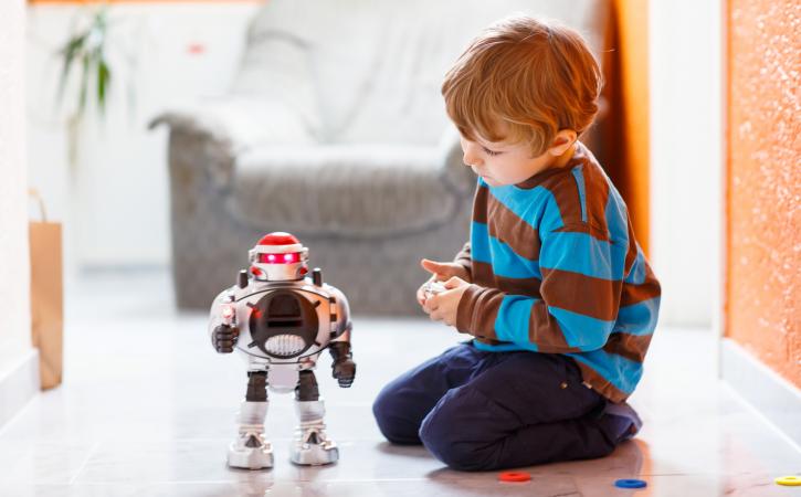 What Is Coding for Kids - Little boy plays with robot